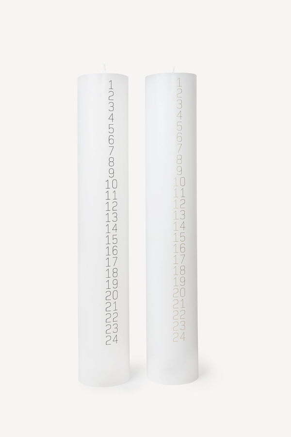 Traditional Danish Christmas countdown pillar candle with black or gold numbers for holidays and gifts