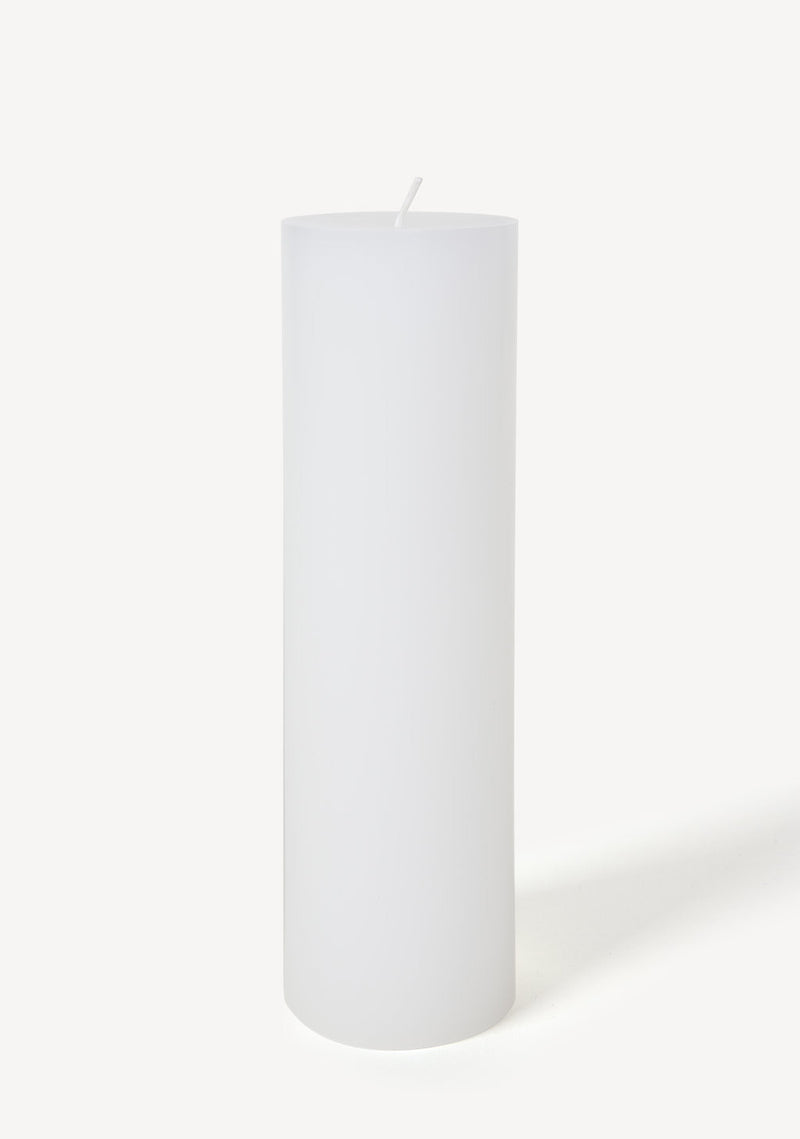 Hand poured Danish unscented white pillar candles available in three sizes for everyday use shown in large size