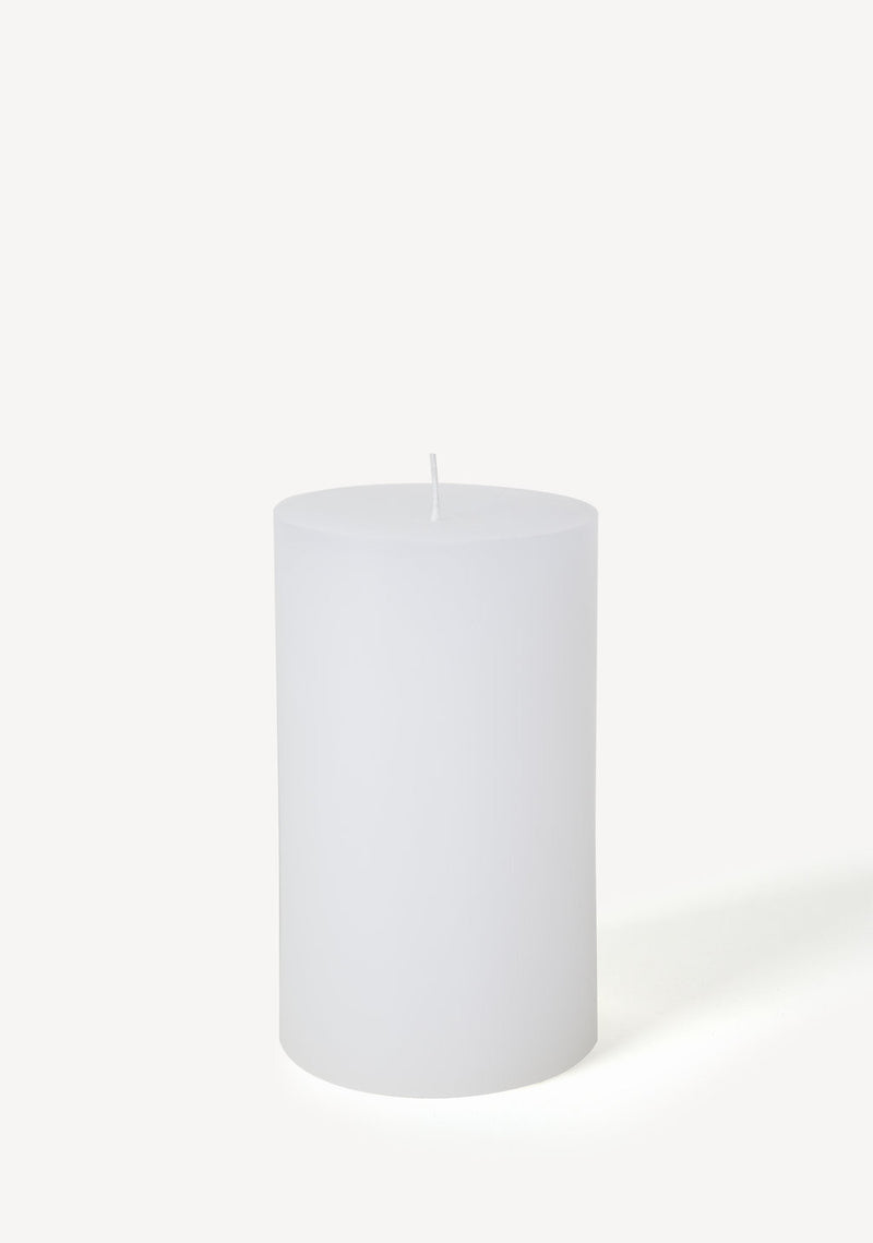 Hand poured Danish unscented white pillar candles available in three sizes for everyday use shown in small size